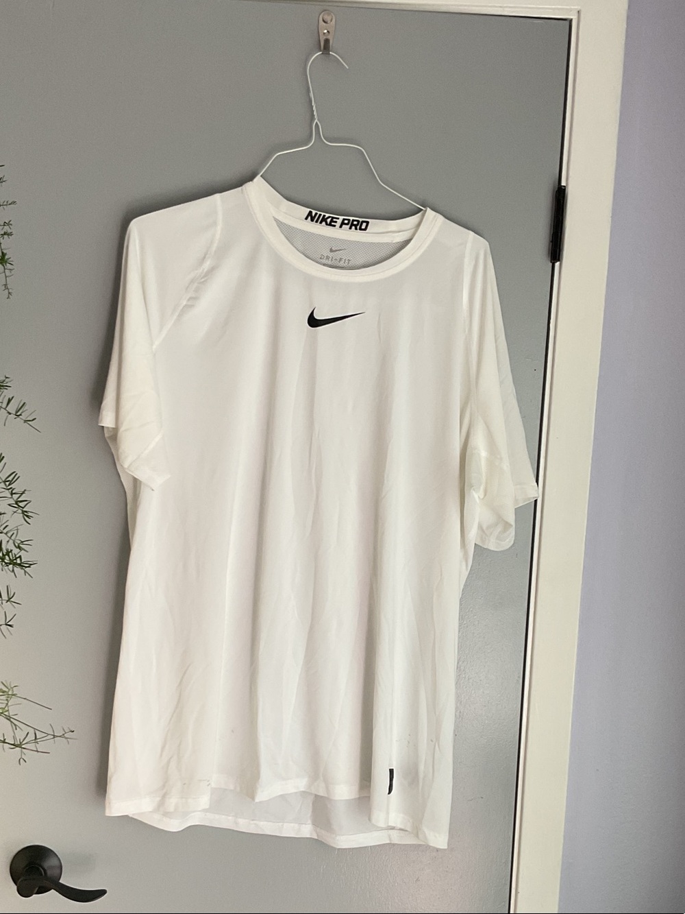Nike White Short-Sleeve Dri-FIT Training Tee with Black Swoosh